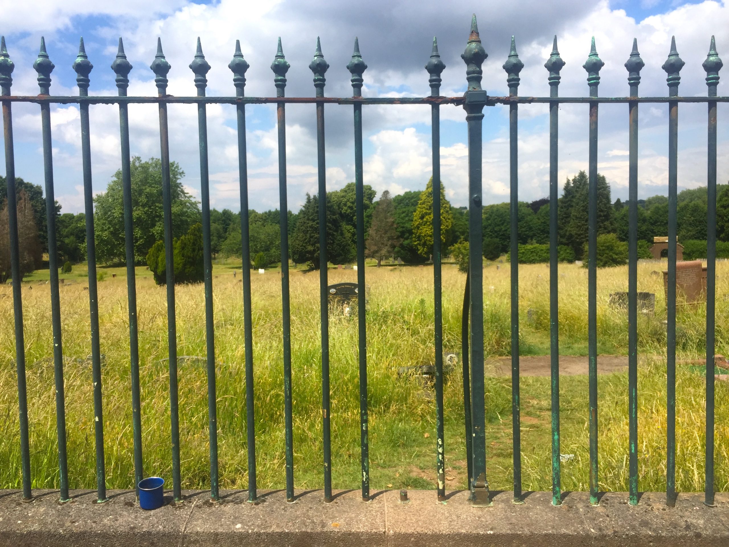 a metal fence with a small gap